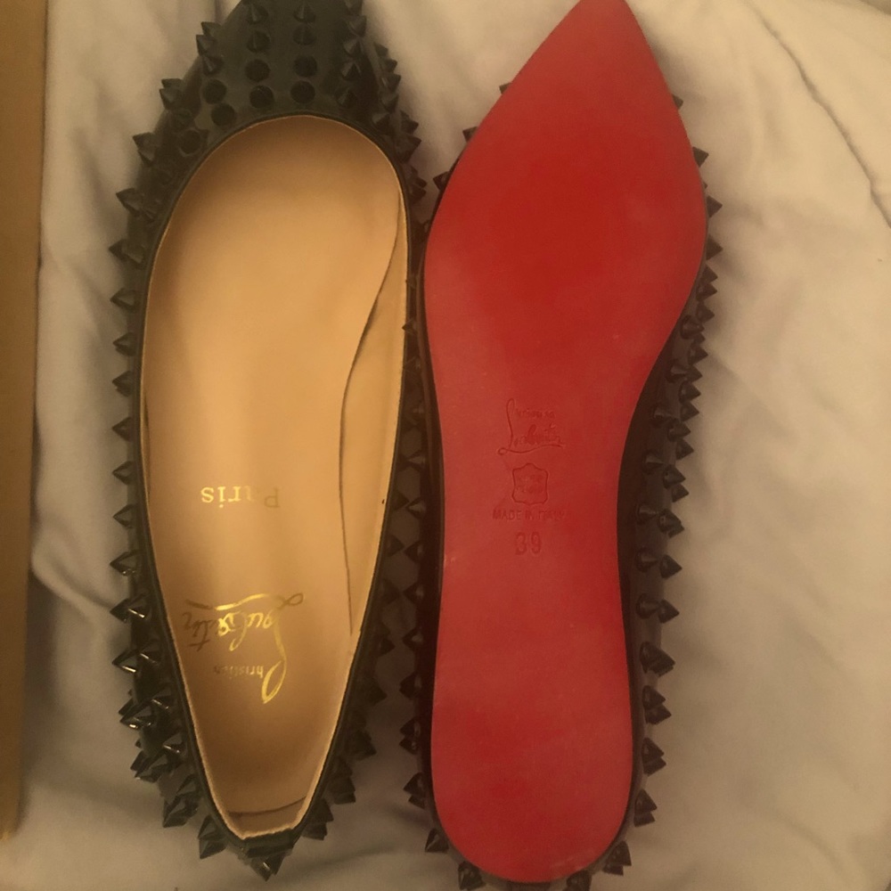 Turn heads stepping out in your new Christian Louboutin Pigalle black flats.